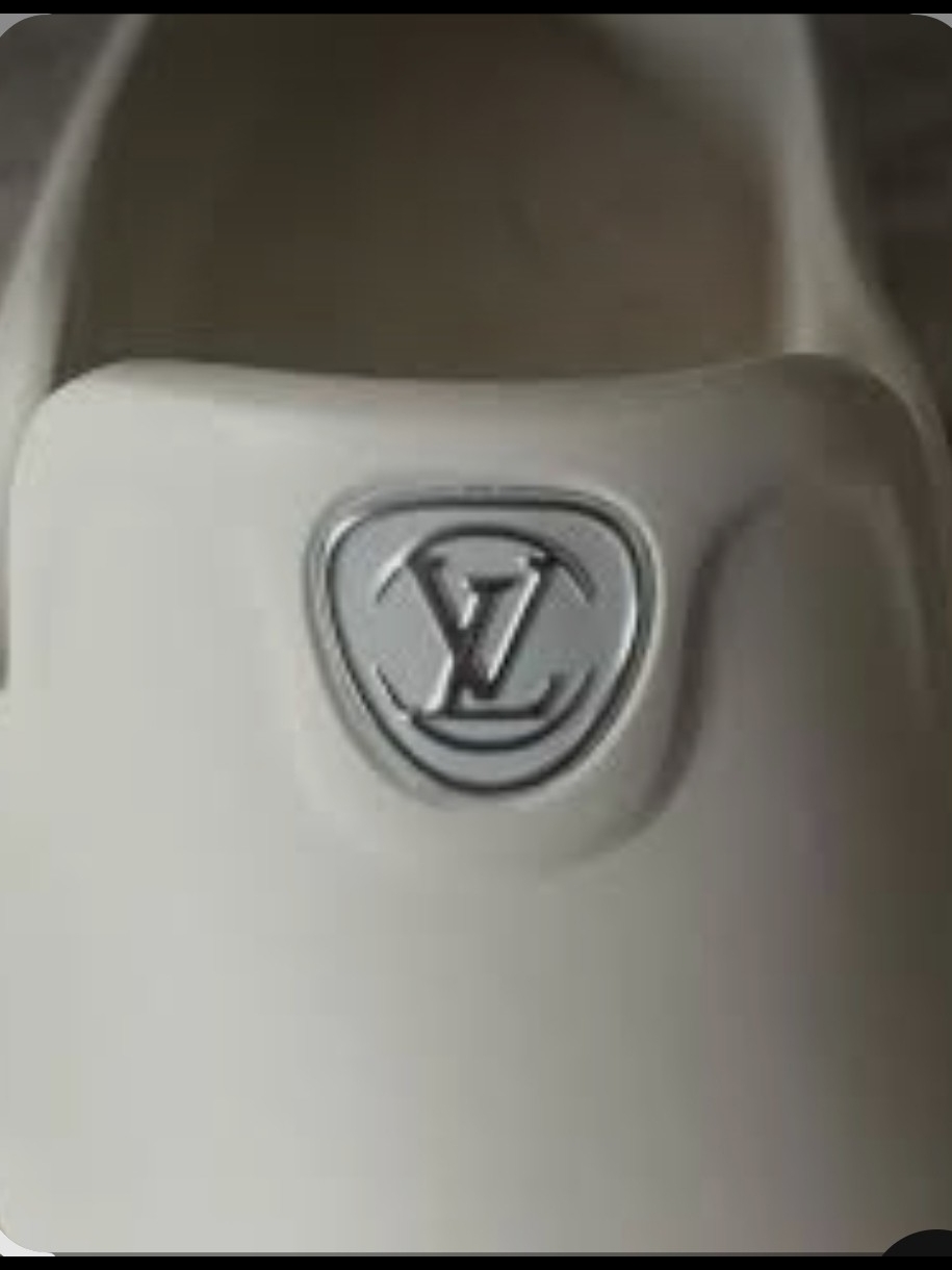 Louis Vuitton Cream Slide With Silver Lv Emblem